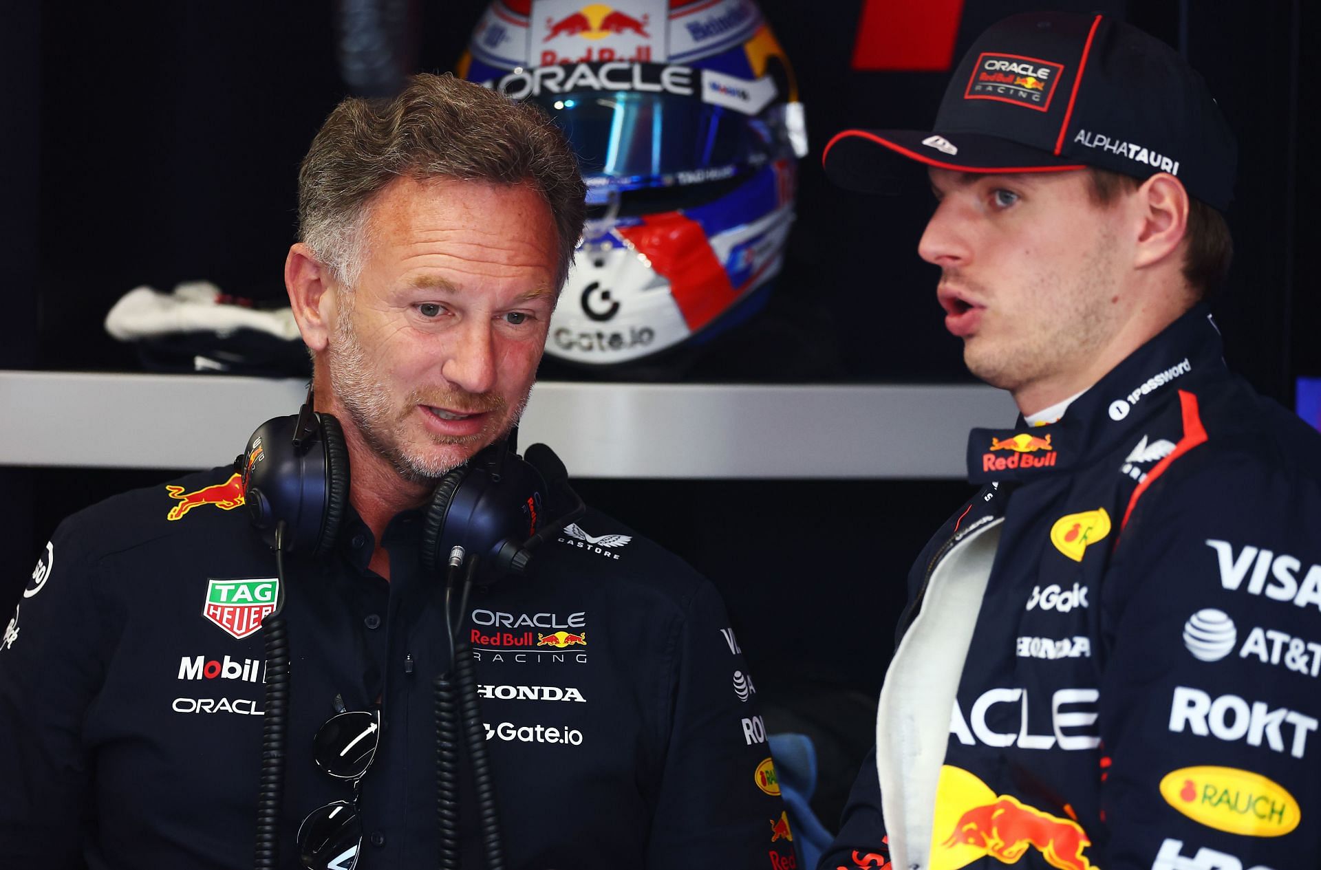 Christian Horner (L) and Max Verstappen (R) at the 2025 F1 Grand Prix of Spain - Source: Getty